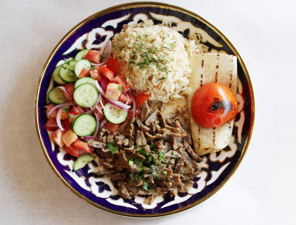 Beef Lamb Gyro Doner · Includes salad and side dish.