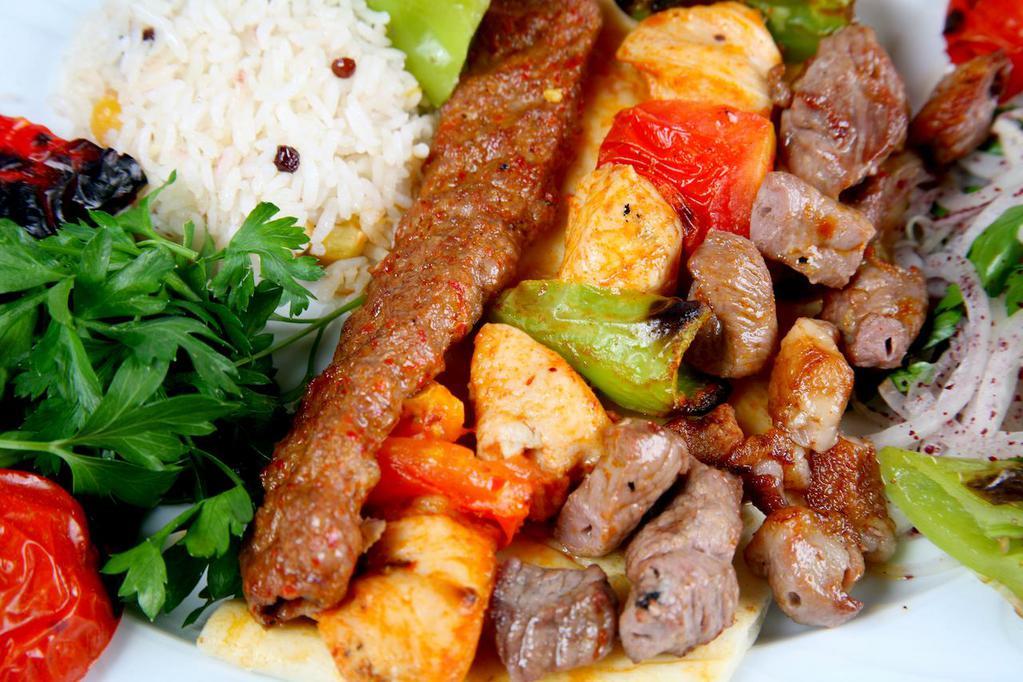 Chicken Shish Kebab · Includes salad and side dish.