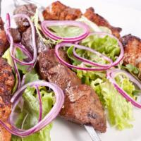 Chicken Gyro Doner · Includes salad and side dish.