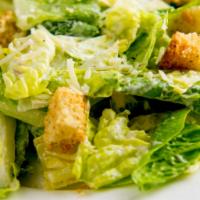 Caesar Salad · Romaine lettuce, Parmesan cheese, crispy croutons and special Caesar dressing.
