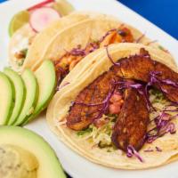Blackened Fish Taco · With cabbage crunch, lettuce, pico de gallo, lime juice, salt, avocado.