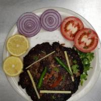 Chapli Kebab · 2 piece patties served with a choice of meat.