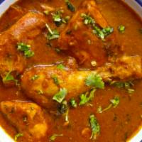 Chicken Curry · A rich chicken curry of exotic spices, fresh tomatoes and herbs.