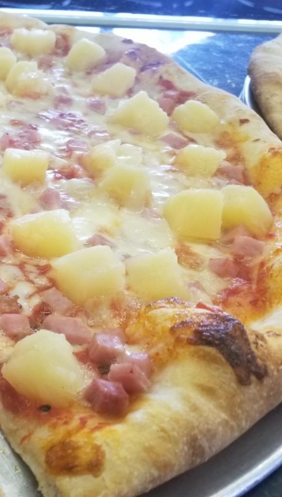 Hawaiian Pizza · Pineapple, ham, mozzarella, and tomato sauce.