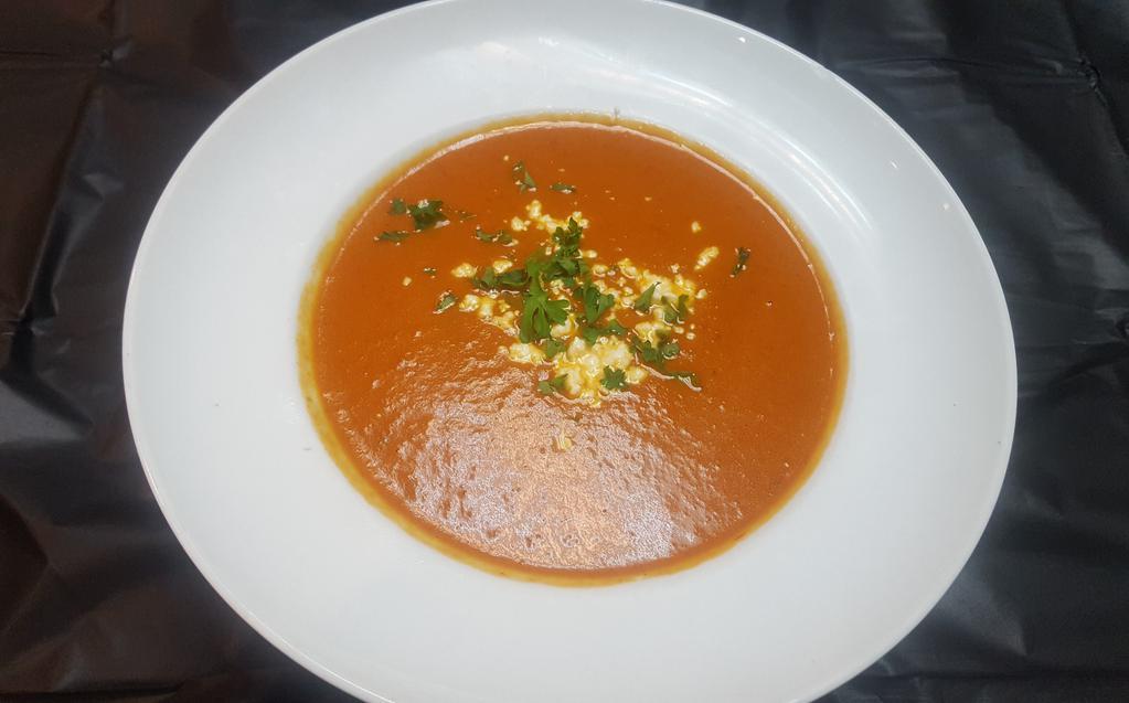 Tomato Artichoke - blow size (served with warm pita) · bread Basil’s house made soup with stewed artichoke hearts and tomato cram.