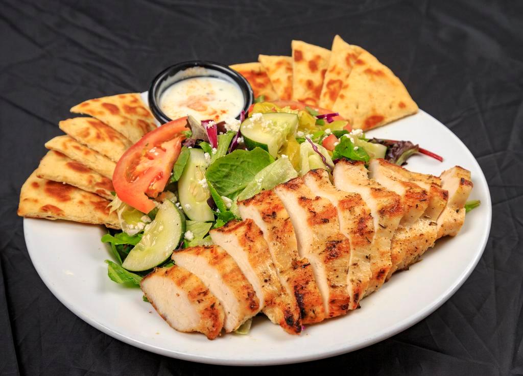 Grilled Chicken Gyros Salad · Butterflied Charbroiled chicken breast with fresh greens, tomato, cucumber, unpitted calamata olives (with seeds), pepperoncini, feta cheese and warm pita bread, served with side of Basil’s tzatziki sauce and Greek dressing. 