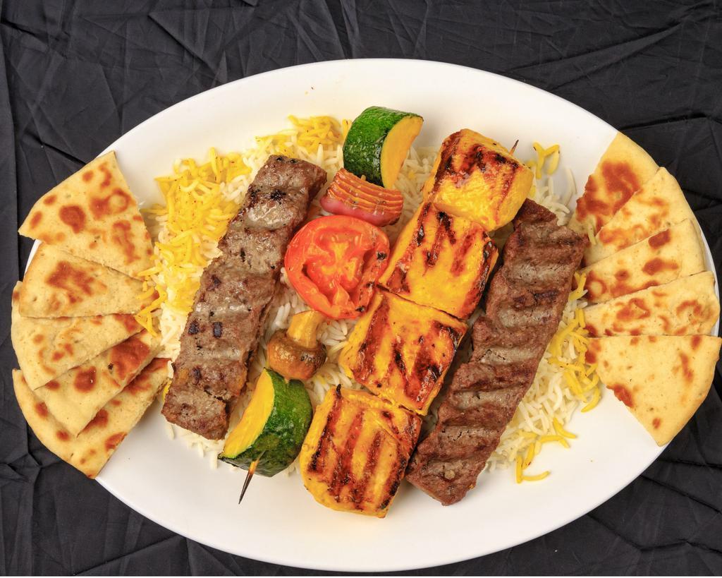 Combo Chicken Shish Kabob and Kubideh · Marinated chicken bread and ground beef kubideh kabob charbroiled and served over basmati rice with a skewer of grilled vegetable.

