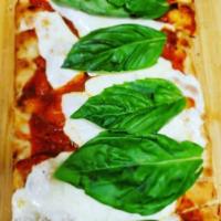 Margherita Flatbread · House pizza sauce, fresh mozzarella cheese, and fresh basil.