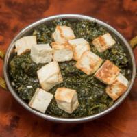 Saag Paneer · Spinach cooked and cottage cheese.