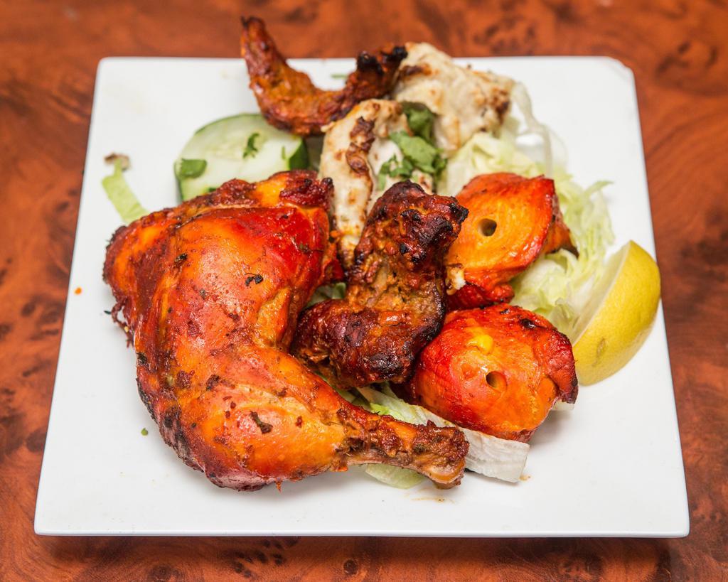 Mix Grill · Assortment of lamb, chicken and seafood delicacies.