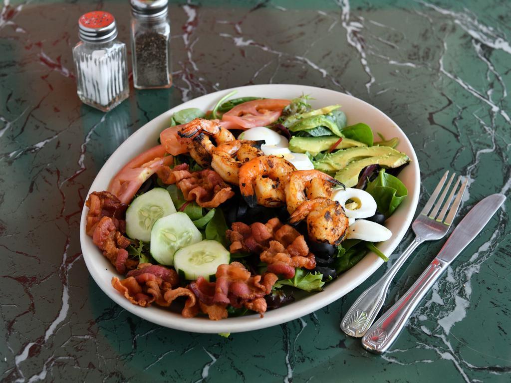 California Shrimp Salad · Shrimp, avocado, bacon, cucumber, tomato, olives and boiled eggs.