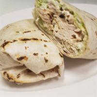 Grilled Chicken Caesar Gourmet Wrap · Grilled chicken with Parmigiana cheese, romaine lettuce and Caesar dressing.