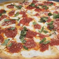 Margherita Pizza · Plum tomato sauce, fresh mozzarella and basil.