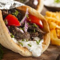 Gyro · Choice slices of chicken or  slices of lamb. Choice of fries or salad. Comes with  lettuce, ...