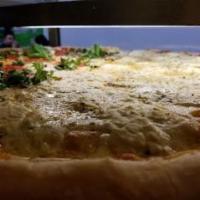 White Pizza · Fresh ricotta and mozzarella cheeses. 