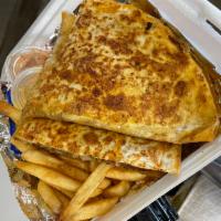 Cheesesteak quesadilla (Combo)  · Cheese steak grilled with onions, Bell pepper, mushrooms and melted Swiss cheese served in 9...
