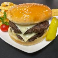Double cheeseburger with fries (Combo) · Two homemade 1/4 burger patties with cheeses a side of a French fries