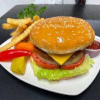 Vegan Burger with fries (Combo) · Vegan burger patties with Lettuce, tomato, onion , pickles cheese and side of French fries 