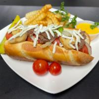 Philly Cheese Dog with fries (Combo) · 1/4 beef hot dog grilled with Bell peppers, onion and mushrooms  with Swiss cheese