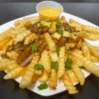 Chili cheese fries  · Large fries basket served with meat and Bean chili with cheese wiz on top 