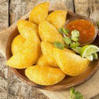 Empanadas Classic  · Colombian Style, choice stuffed beef or chicken