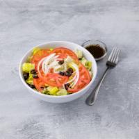 David House Salad · Romaine lettuce, cucumber, tomato, onions and black olives.