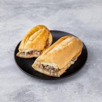 Philly Steak Hero · Served with provolone cheese, mushrooms and onions.