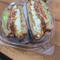 9. Spicy Chicken Cutlet Sandwich · Served with cheese, lettuce and tomato.