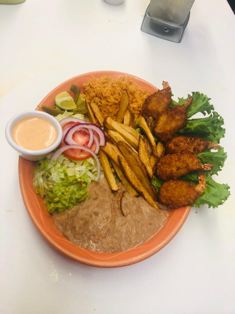 Camarones Empanizados · Breaded jumbo shrimp served with rice, beans, salad, french fries and guacamole.