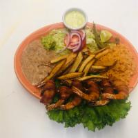 Camarones Momia Plate · Bacon wrapped jumbo shrimp served with rice, beans, salad, french fries and guacamole.
