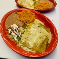2 Enchiladas de Camaron Plate · Shrimp enchiladas served with rice, beans, salad and cream.