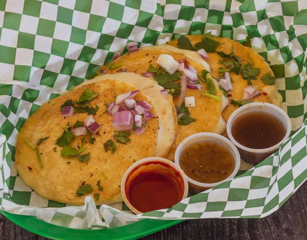 Pastor Quesadillas · 3 Asadero Cheese Quesadilla loaded with Pastor Steak.
Onion, cilantro , lime & green salsa on the side.