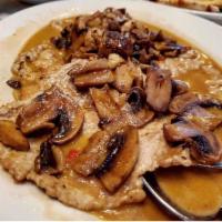 Veal Marsala · Cooked in a wine sauce.