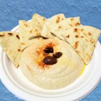 Hummus Meze · Creamy chickpea and tahini dip. Served with choice of pita or fresh cut vegetables.