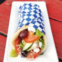 Salata and Hummus Pita · Classic Greek salad with romaine lettuce, tomatoes, onions, peppers, cucumbers, olives, and ...