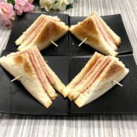 Ham and  Egg Sandwich · Sandiwch built with pork and cheese. 