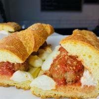Meatball Parm · My Grandmothers meatballs in sauce with melty mozzarella