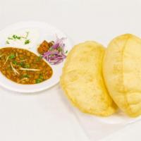 Chole Bhatura · Two bhatura, chole, pickle, onion and raita