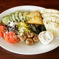 Greek Platter · Tiropita, spanakopita, meatballs, feta, tomatoes, dolmades, Greek olives, pepperoncini, cucu...