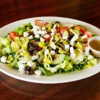 Greek Salad · Fresh romaine lettuce, tomatoes,cucumbers, green pepper, onion, Greek Olive, feta cheese, pe...
