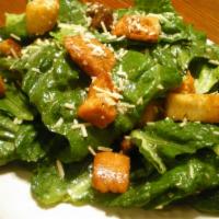 Caesar Salad · French romaine lettuce, Parmesan cheese and croutons.