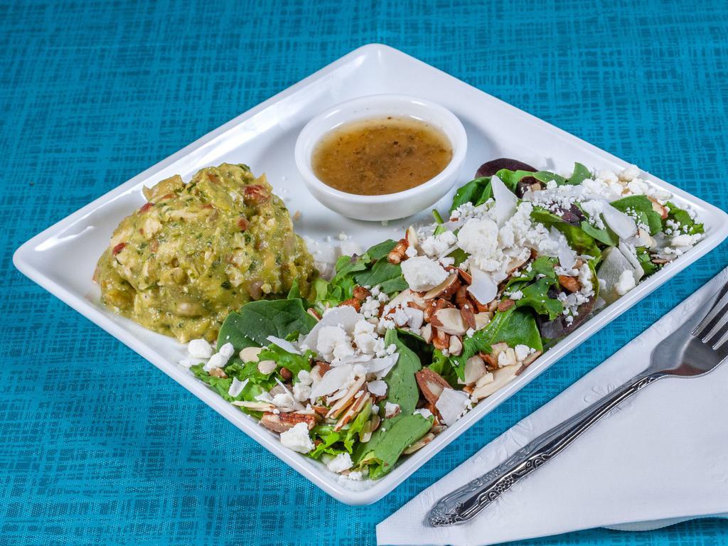 Keto Salad Lunch  · Organic mixed greens, organic goat OR feta cheese, almonds, pecans, coconut chips with scoop of egg salad OR chicken avocado salad. Served with House made vinaigrette dressing (no sugar) unless another is requested.