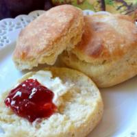 Anita Biscuit · 2 biscuits served with butter and your choice of jam (peach, strawberry, or concord grape).