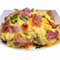 Eaton Z. Biscuit · 2 biscuits with two scrambled eggs and your choice of double thick bacon or a sausage patty.