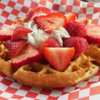 Strawberry & Cream Belgian Waffle · Large Belgian waffle smothered in strawberries and whipped cream. 