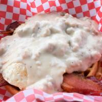 The Belgian Country Breakfast Waffle · Large Belgian waffle with egg, bacon and country gravy smothered on top. Oh snap!