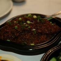 Ants Climb on Tree · Fine mince of beef fillet stir-fried with cellophane noodles in spicy garlic sauce, garnishe...