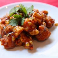 Chan-Do Chicken · Chicken nuggets marinated with Chinese spices and sauteed with ginger, hot pepper, garlic an...