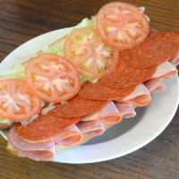 2. Cold Italian Hero · Boar's Head ham, salami, pepperoni, provolone cheese, lettuce, tomato, oil and vinegar.