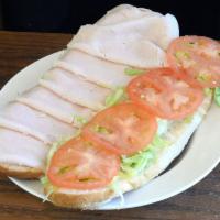 8. The Healthy Cold Sandwich · Turkey breast, Muenster cheese, lettuce, tomato and honey mustard.
